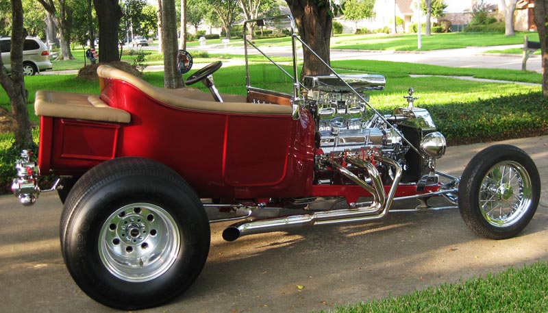 Larry Howard-Houston, Texas - 1923 T Bucket - 355 Cubic Inch Chevy - Inferno Red - Chrome by Speed & Sport Chrome Plating